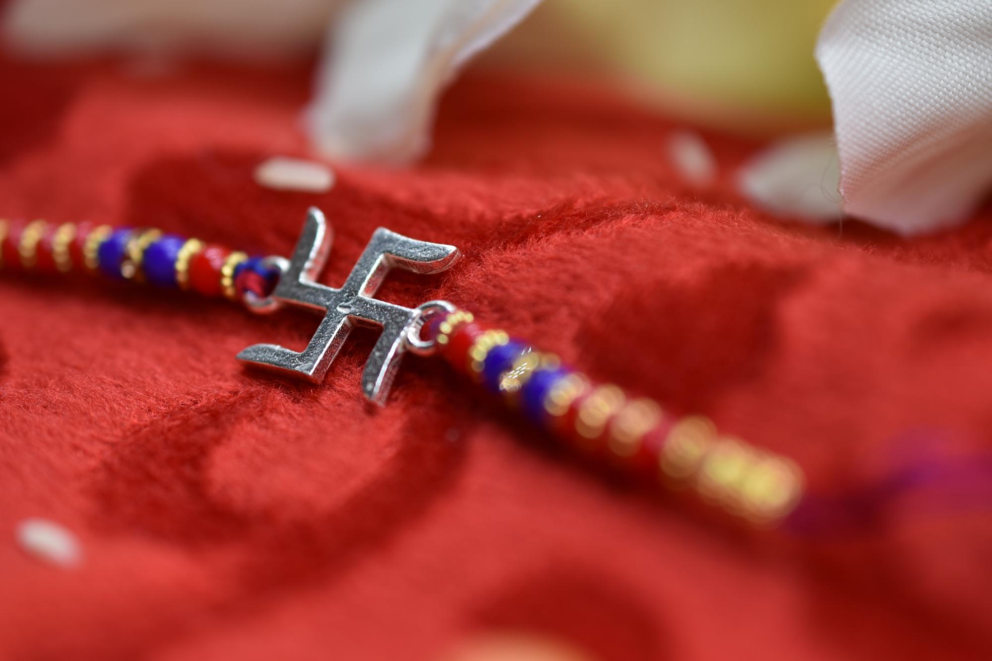 Detail of satin stitch and bullion knots on silk